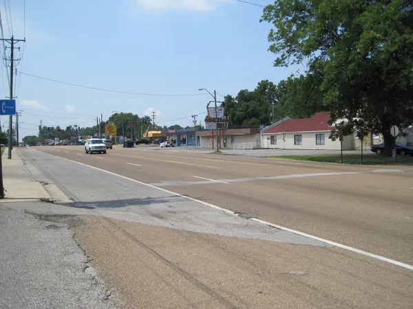 Woman shot while leaving Frayser apartment complex as gunfire strikes nearby units, child hurt by glass