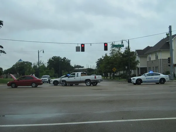 Two-vehicle crash in East Memphis sends one driver to hospital after early-morning lane-change collision